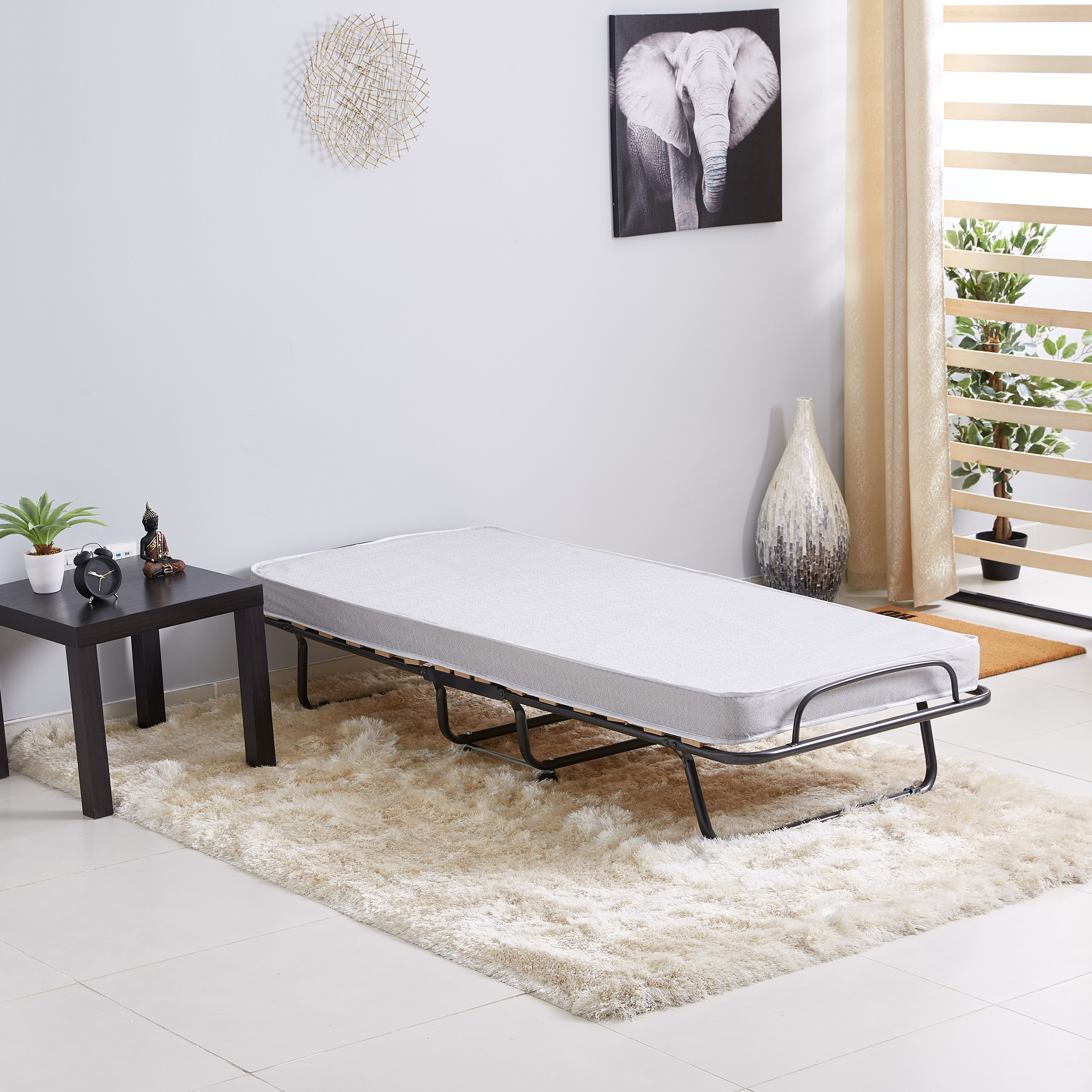 Fold up bed store with mattress