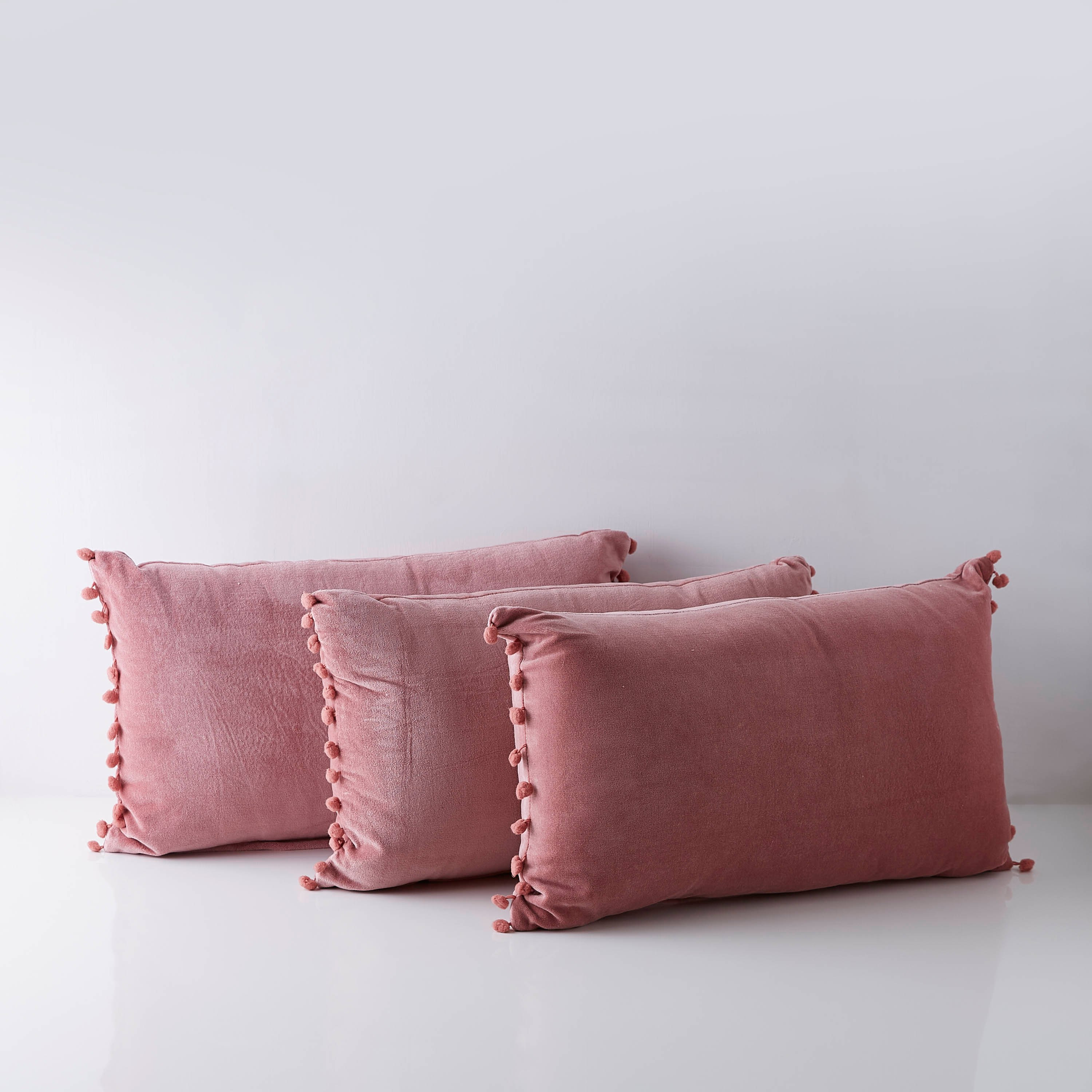 Velvet pom pom store cushions