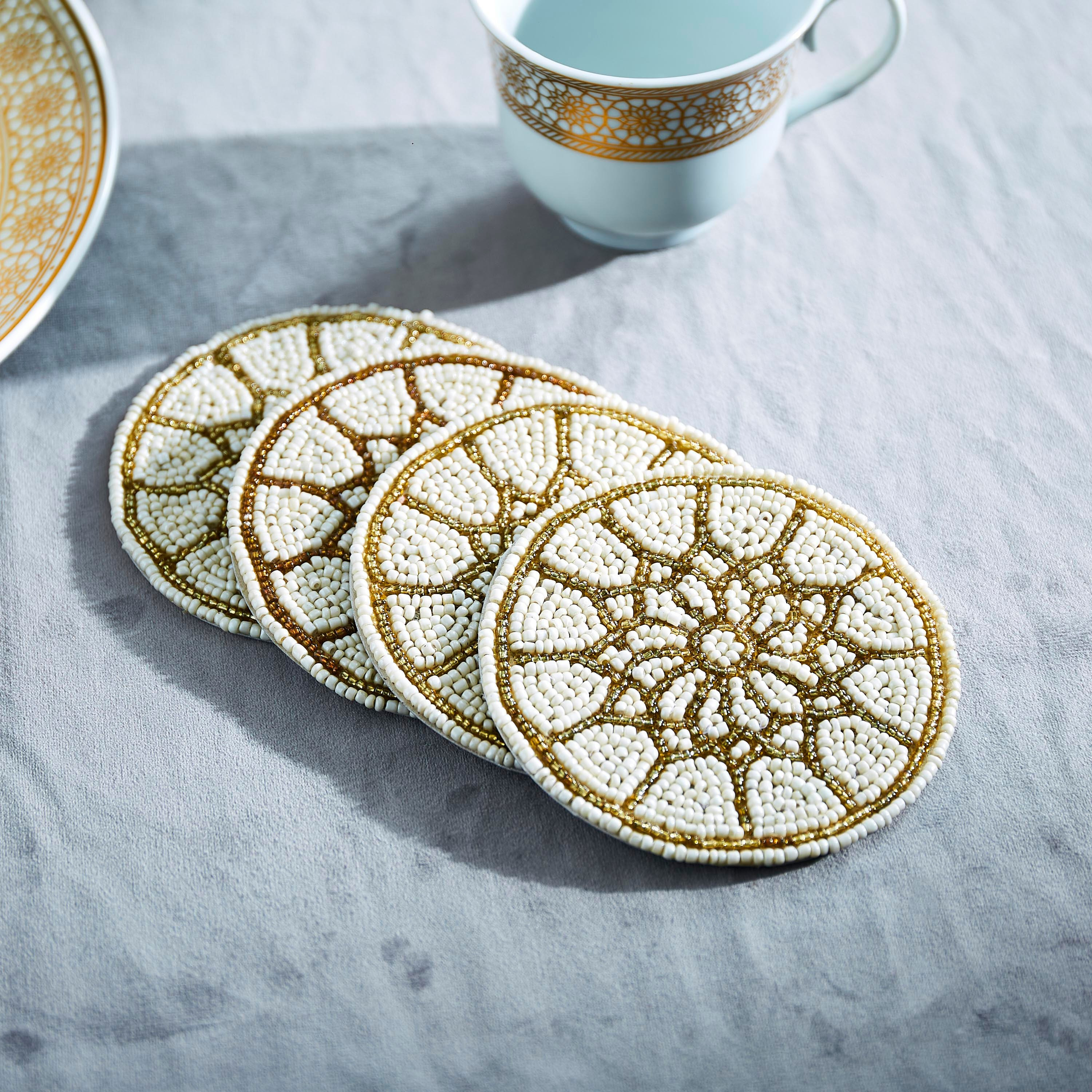 طقم واقيات طاولة مزين بالخرز تاسين 4 قطع من مشربية-hbxdecorandfurnishings-homefurnishings-tablelinens-image-1