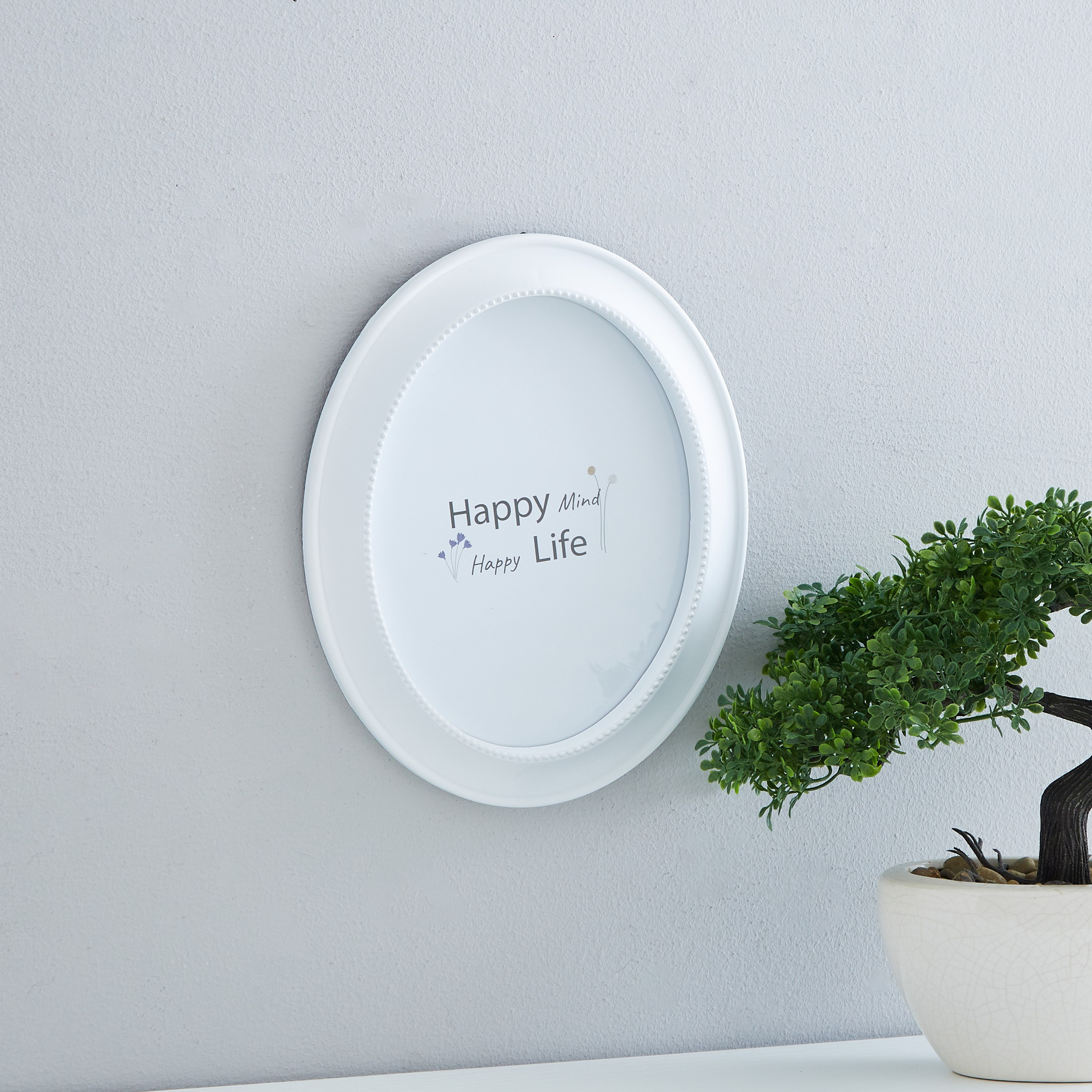 برواز صور بيضاوي من ليا - 20x2x25 سم-hbxbedroom-decorandaccessories-photoframes-image-1