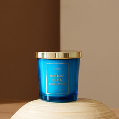 Claire Bamboo Leaf and Blue Lotus Glass Jar Candle - 220 gms