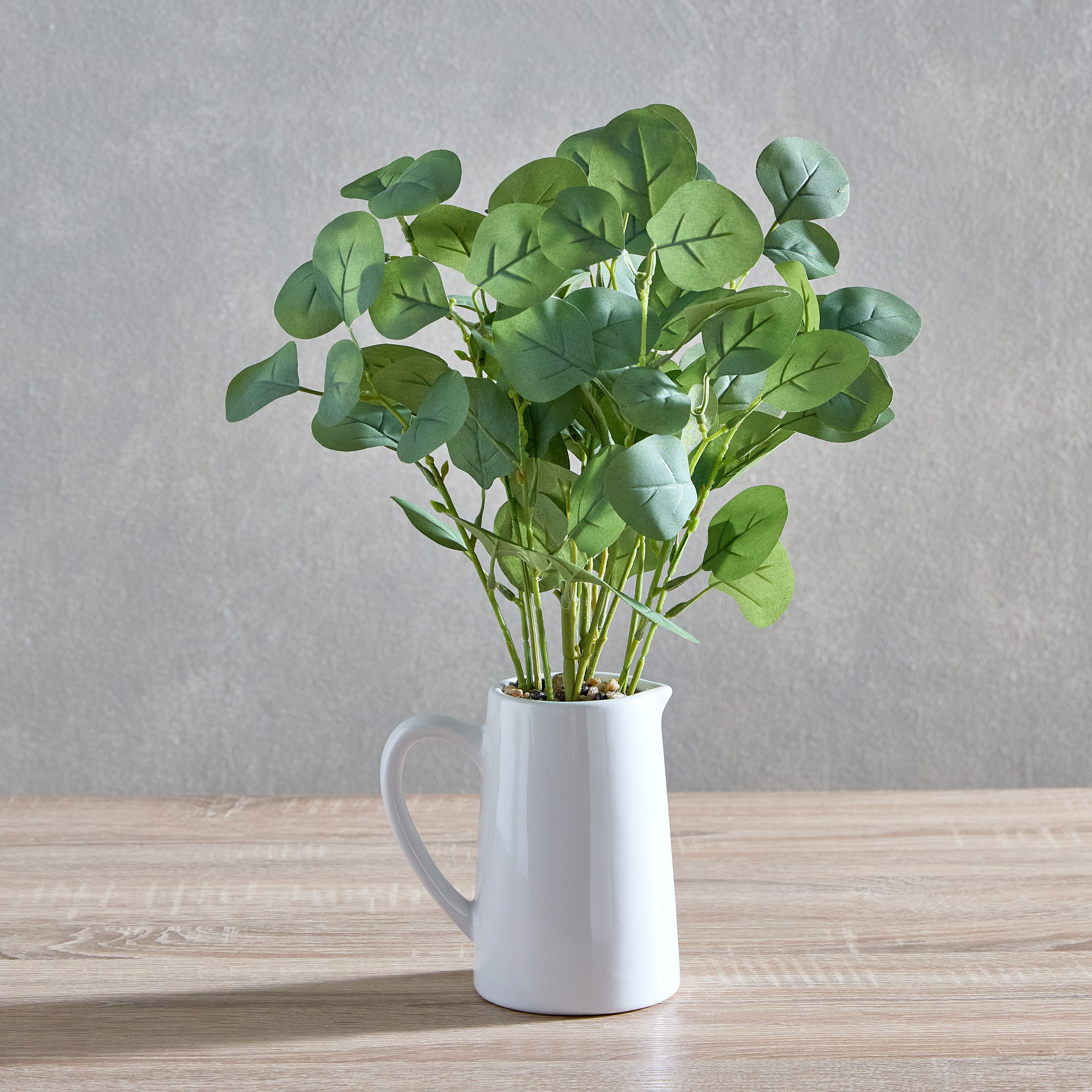 نبات صناعي بأوراق الأوكالبتوس في إناء سيراميك بمقبض من هيلينا - 15x15x43 سم-hbxhomeware-hbxdecorandfurnishings-image-1