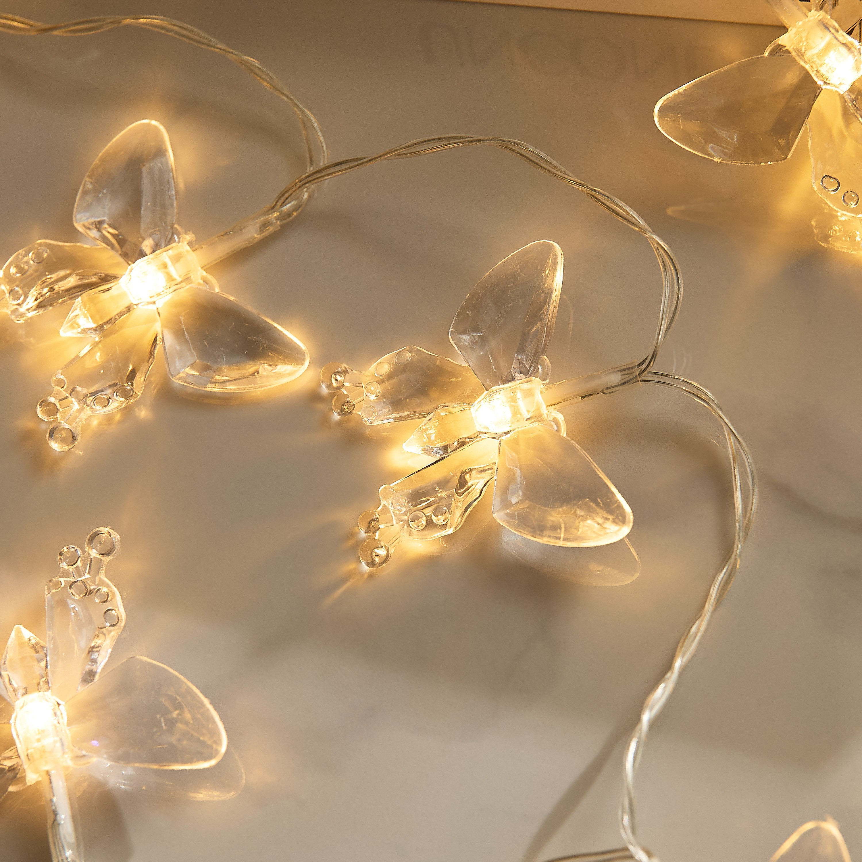 سلسلة إضاءة فراشة أكريليك الشفاف بـ10 لمبات إل إي دي دافئة من دوكس-hbxdiningroom-lighting-decorativesandstringlights-image-3